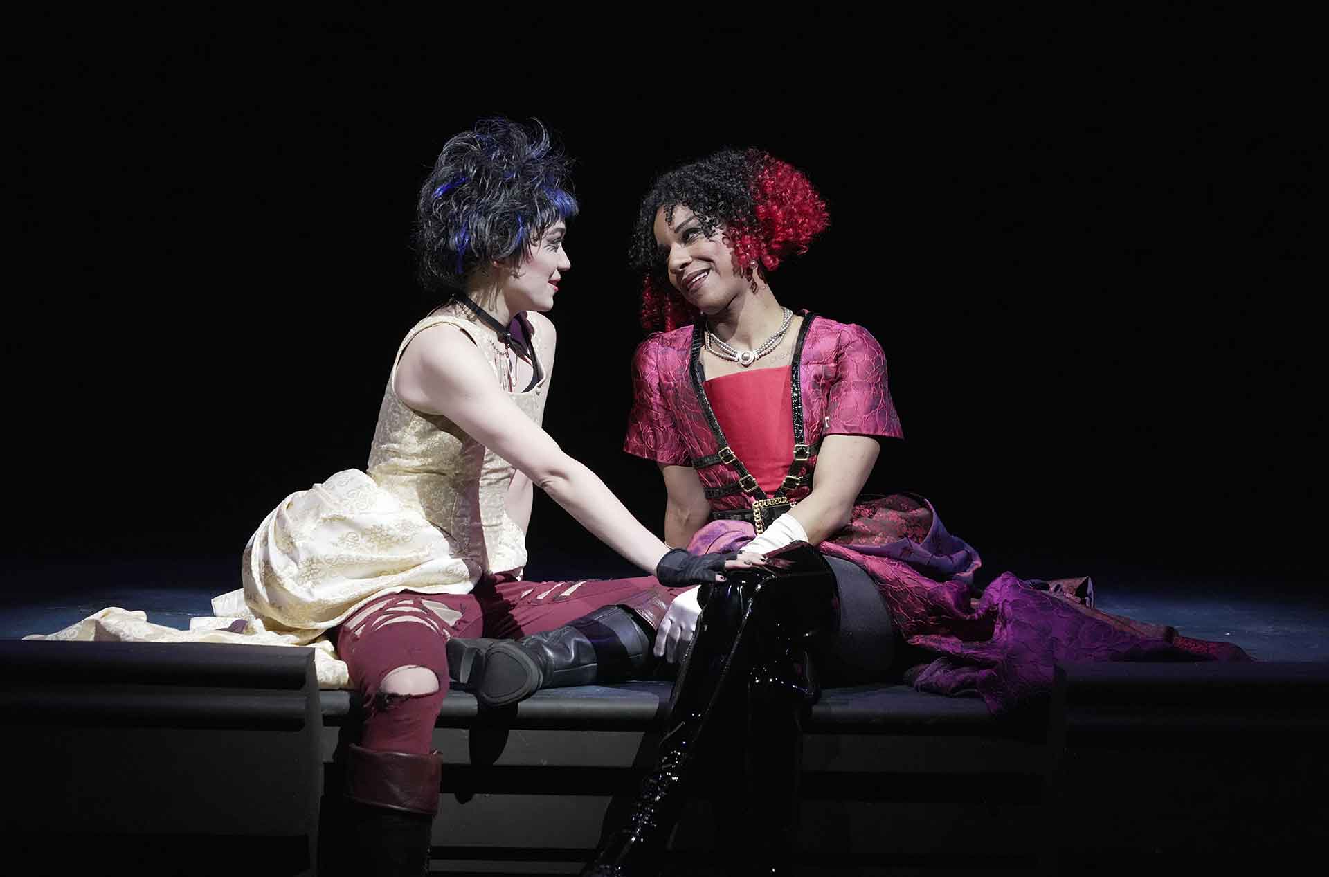 Two people gazing into each others eyes.