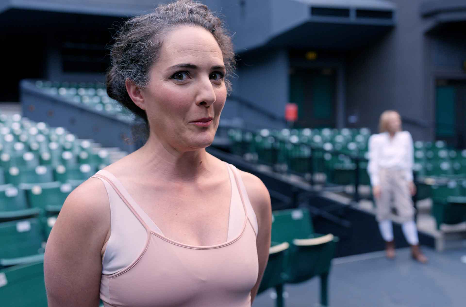 Person standing making a not serious face at the camera.