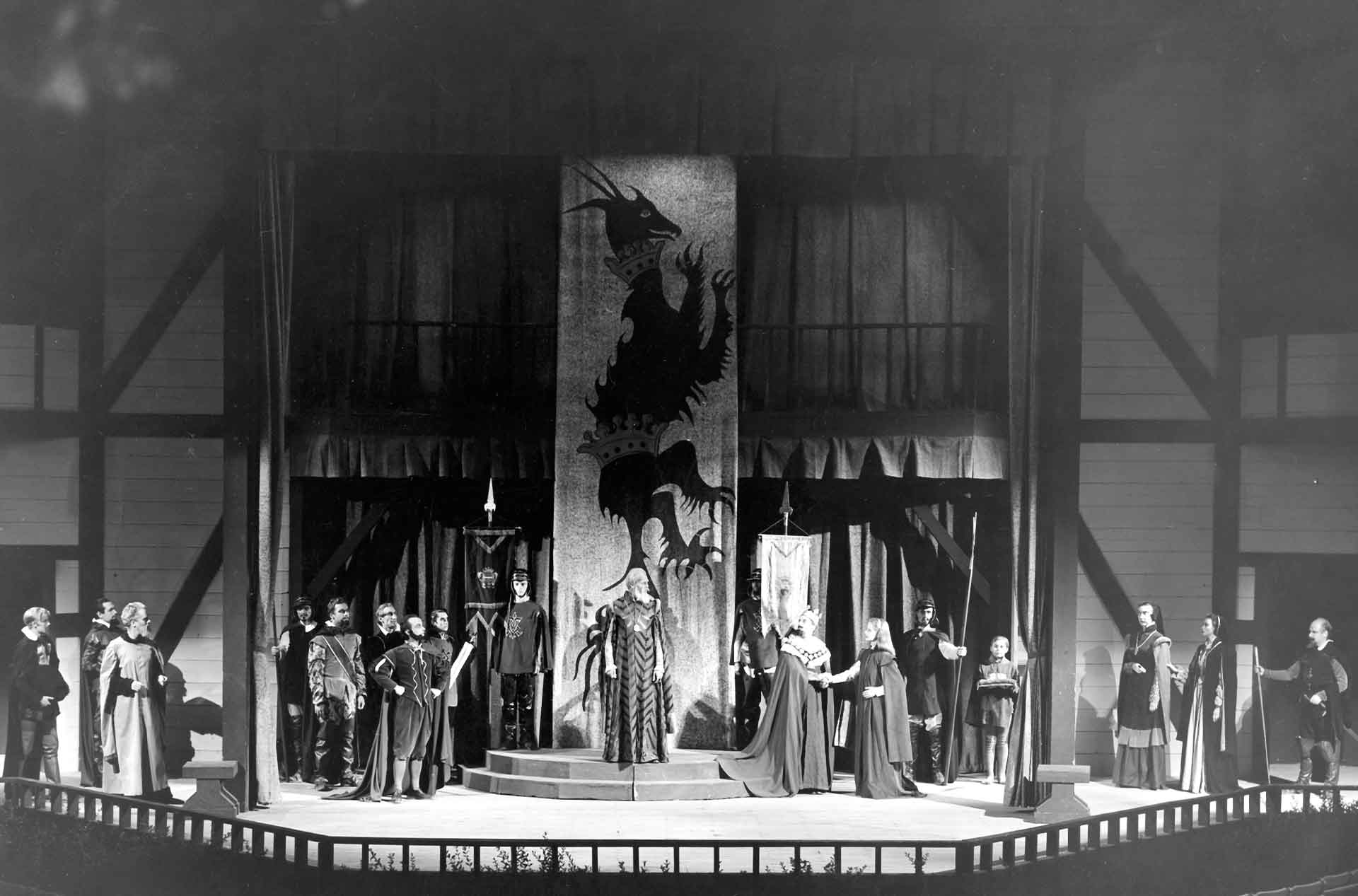 Group of people standing on a stage.