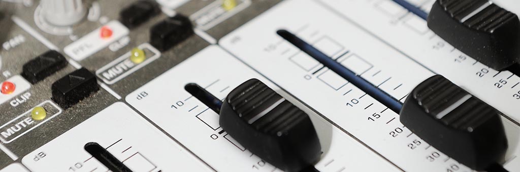 A close up of a sound board.