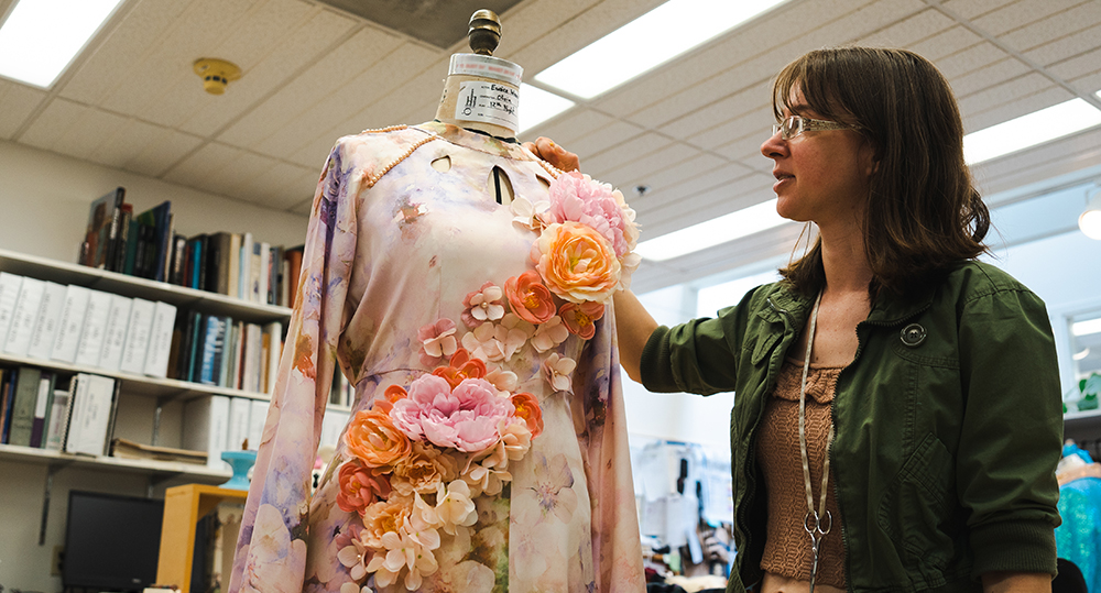 Lead Draper Virginia Kilkelly works on a costume for Twelfth Night
